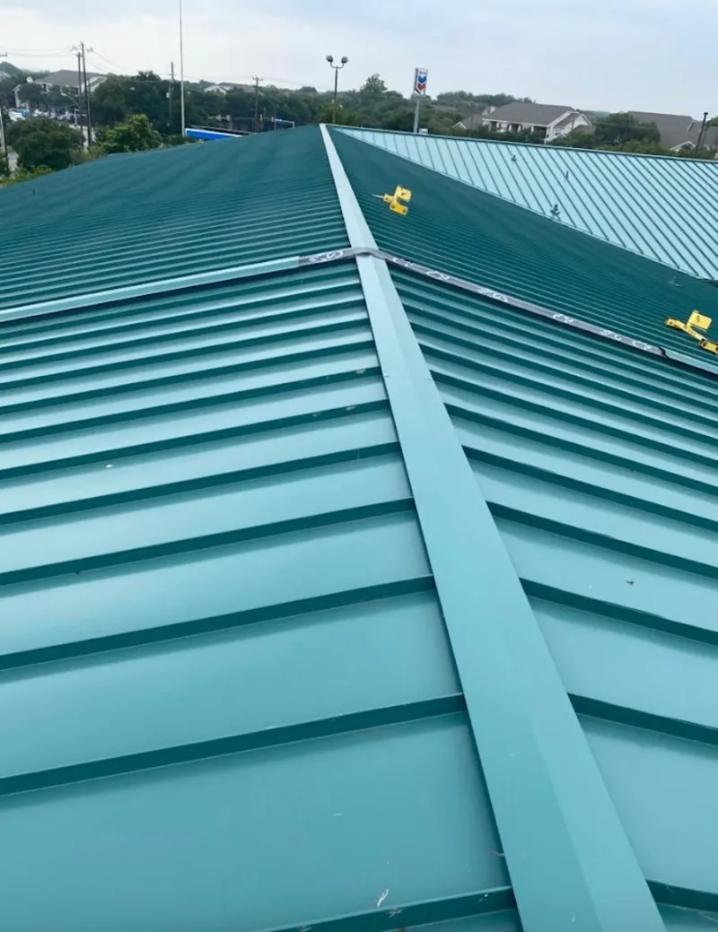 Green commercial metal roof ridge and valley for Metal Roof Repair in Norman