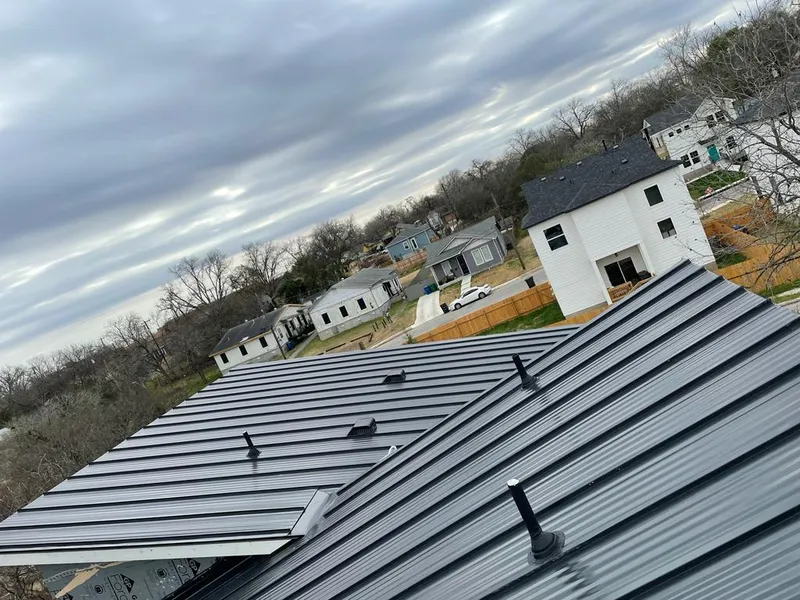 Standing seam metal roof panels with vents for Skylight Repair in Norman